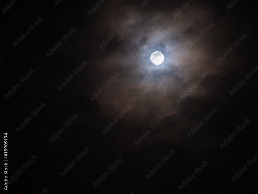 Clouds were All Over The Sky behind The Halo Moon Clouds were All Over The Sky behind The Halo Moon