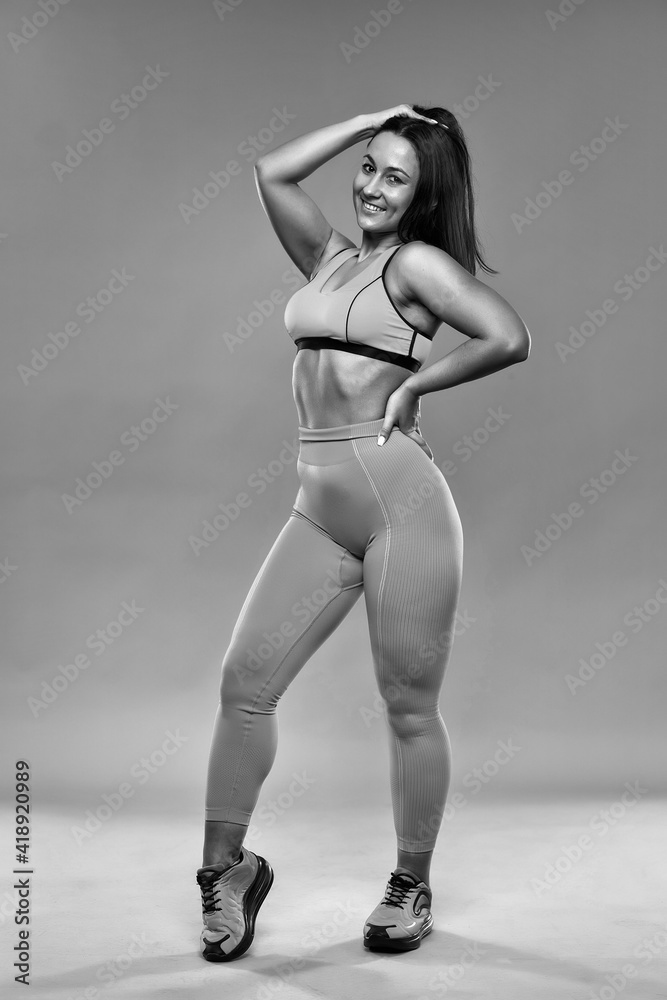 Fototapeta premium Curvy woman doing fitness exercises