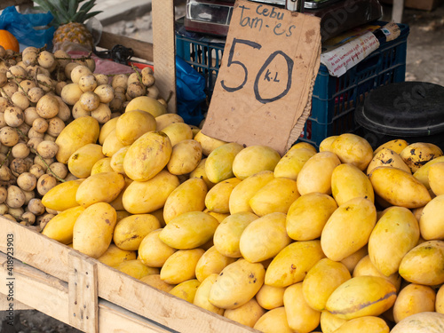 Ripe yellow mango at market