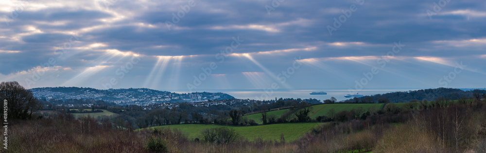 DANCING RAYS of SUNRISE over TORQUAY from Burial Ground Fields, Devon, England, Europe