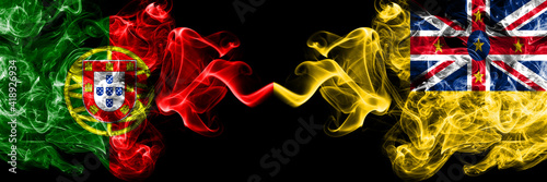 Portugal, Portuguese vs New Zealand, Niue smoky mystic flags placed side by side. Thick colored silky abstract smoke flags.