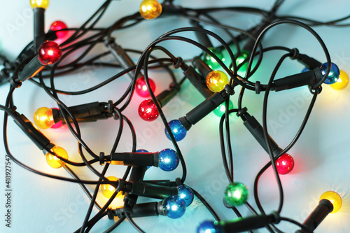 colourful christmas lights on blue background
