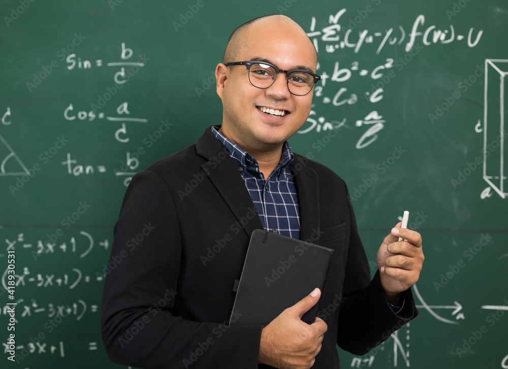 Young asian teacher man teaching video conference with student. Male Indian teacher training the mathematics in classroom from online course.