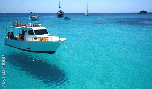 Transparent and blue water in the sea of Lampedusa at the beach of the Rabbits. The Pelagie Islands are the southernmost point of Italy in Sicily.