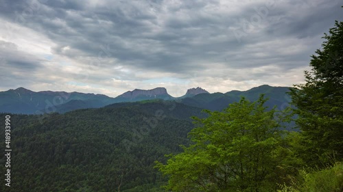 The formation and movement of clouds over the summer slopes of Adygea Bolshoy Thach and the Caucasus Mountains