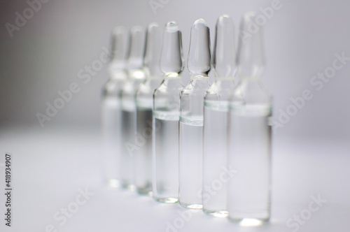 Medical ampoules for injection isolated on white background. Medicines and disease treatment  pharmacology and science concepts