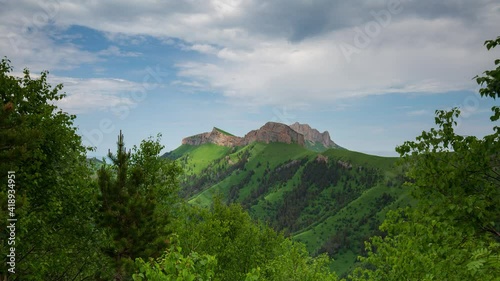The formation and movement of clouds over the summer slopes of Adygea Bolshoy Thach and the Caucasus Mountains