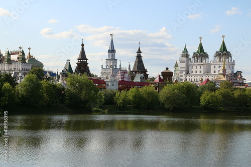 view of the Izmailovsky kremlin across the lake moscow Russia summer
