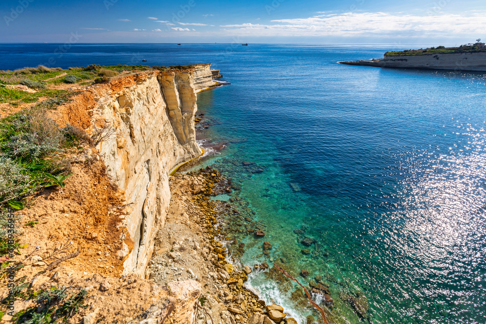 Beautiful cliffs of Malta at the Marsaxlokk village.