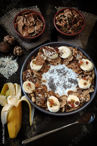 Healthy breakfast bowl. Chia yogurt with banana and muesli. Delicious healthy eating.