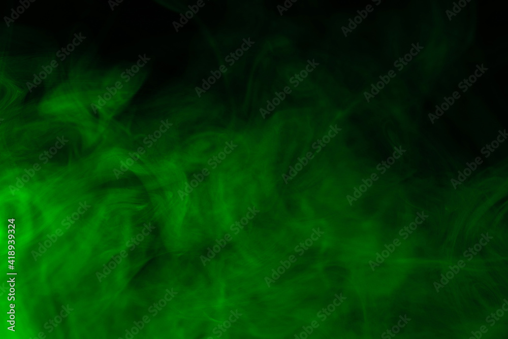 Green steam on a black background. Green steam on a black background.