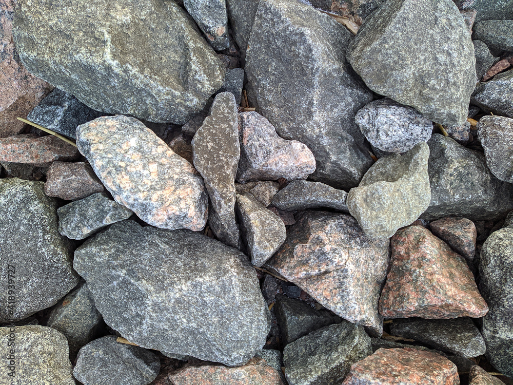 texture and background of colored stones on the river bank in the daytime texture and background of colored stones on the river bank in the daytime