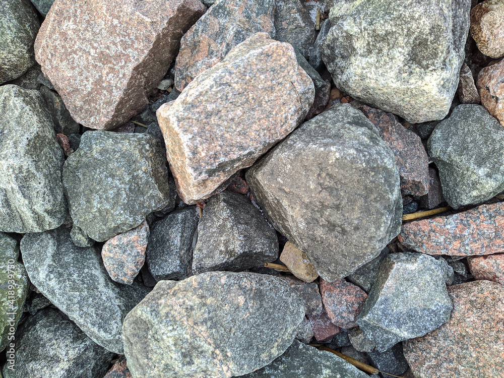 texture and background of colored stones on the river bank in the daytime texture and background of colored stones on the river bank in the daytime