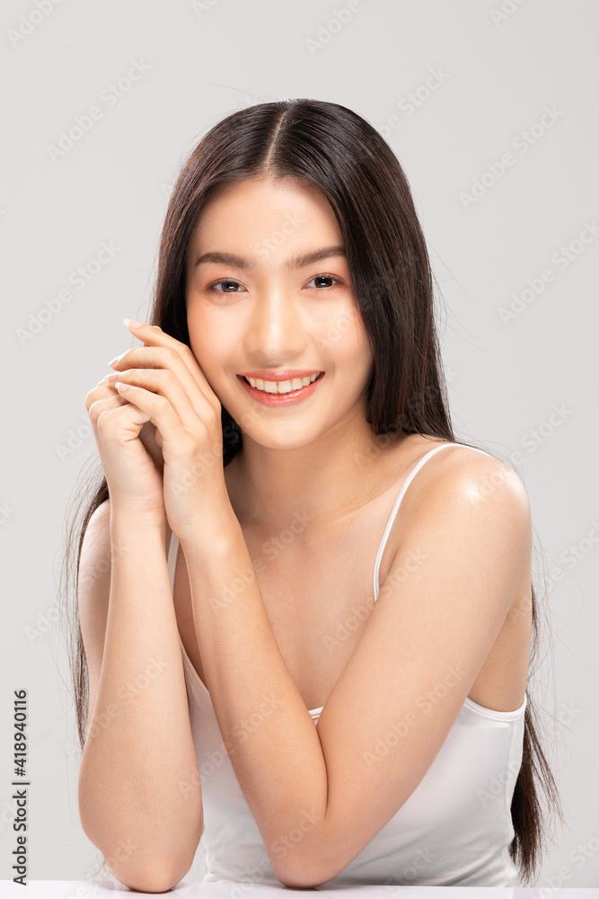 Beautiful Young Asian Woman Holding Hands smile feeling so happy and cheerful with healthy Clean and Fresh skin,isolated on white background,Beauty Cosmetics Concept Beautiful Young Asian Woman Holding Hands smile feeling so happy and cheerful with healthy Clean and Fresh skin,isolated on white background,Beauty Cosmetics Concept