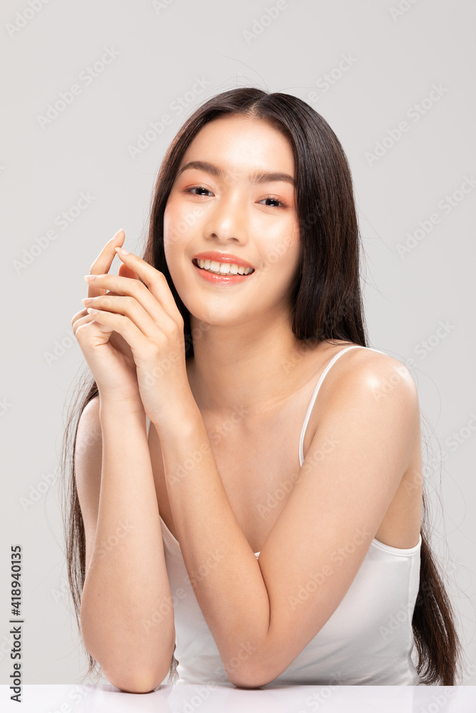 Beautiful Young Asian Woman Holding Hands smile feeling so happy and cheerful with healthy Clean and Fresh skin,isolated on white background,Beauty Cosmetics Concept Beautiful Young Asian Woman Holding Hands smile feeling so happy and cheerful with healthy Clean and Fresh skin,isolated on white background,Beauty Cosmetics Concept