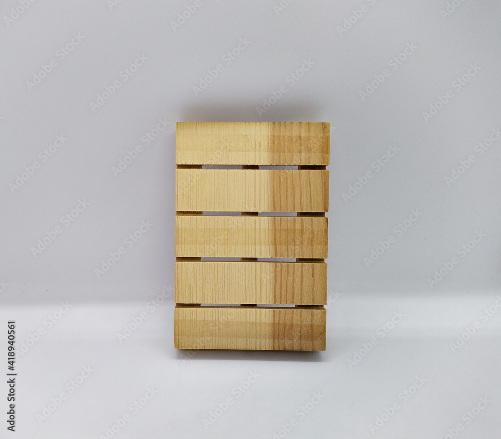 one coaster. one wooden coaster for a cup on a white background one coaster. one wooden coaster for a cup on a white background