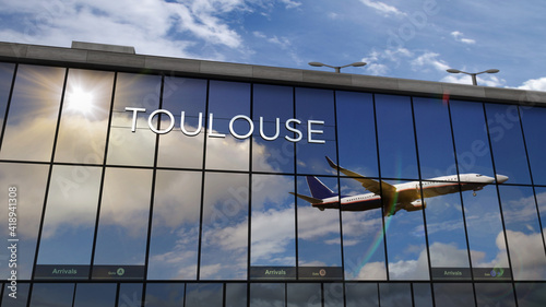 Airplane landing at Toulouse France airport mirrored in terminal