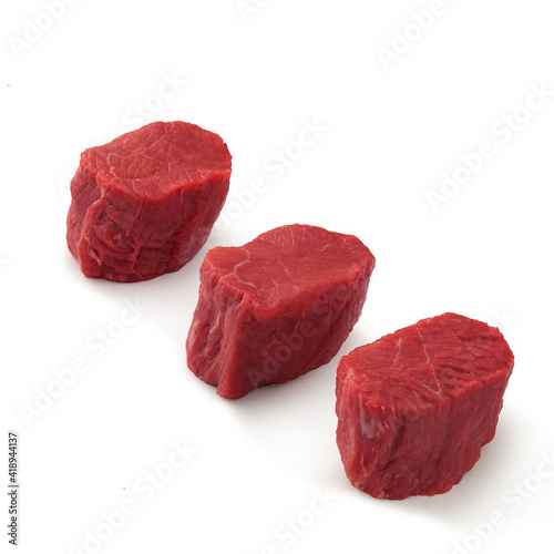 Close-up view of fresh raw Shoulder Petite Tender Medallions Chuck Cut in isolated white background