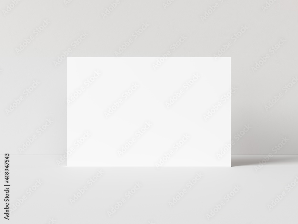 One blank horizontal rectangle poster template standing on white table with white background. 3D illustration One blank horizontal rectangle poster template standing on white table with white background. 3D illustration