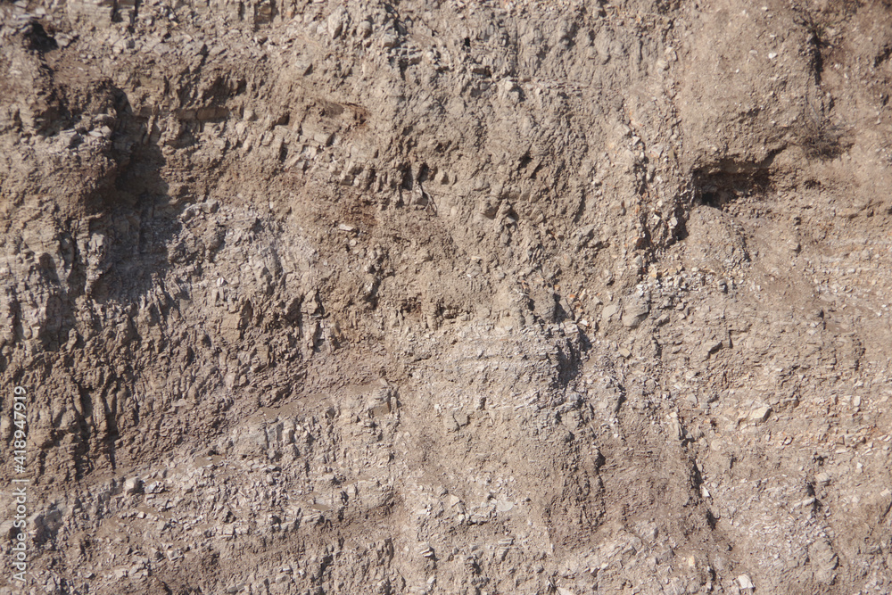 Full frame close-up view of the earth and sand of a cliff wall on the southern California Pacific ocean coast Full frame close-up view of the earth and sand of a cliff wall on the southern California Pacific ocean coast