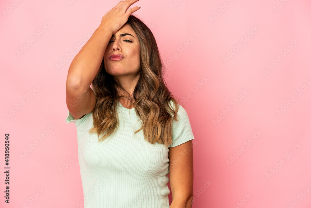 Young caucasian woman isolated forgetting something, slapping forehead with palm and closing eyes. Young caucasian woman isolated forgetting something, slapping forehead with palm and closing eyes.