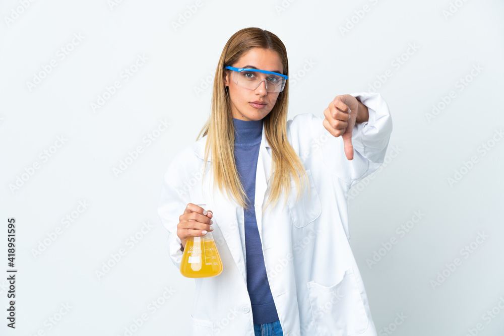 Young scientific woman isolated on white background showing thumb down with negative expression Young scientific woman isolated on white background showing thumb down with negative expression