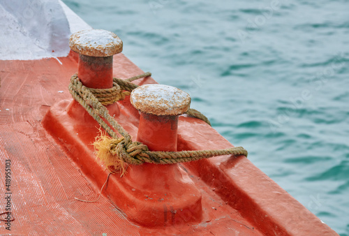 Closeup view of an Indian fishing boat capstan with ropes attached.