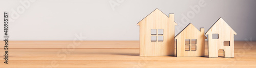 wooden house models on table