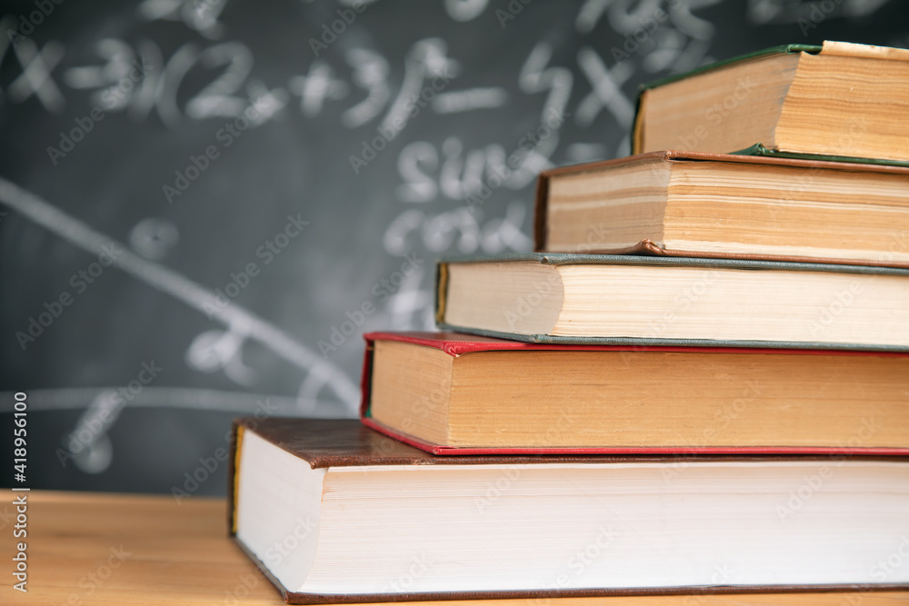 books on the desk in the auditorium books on the desk in the auditorium
