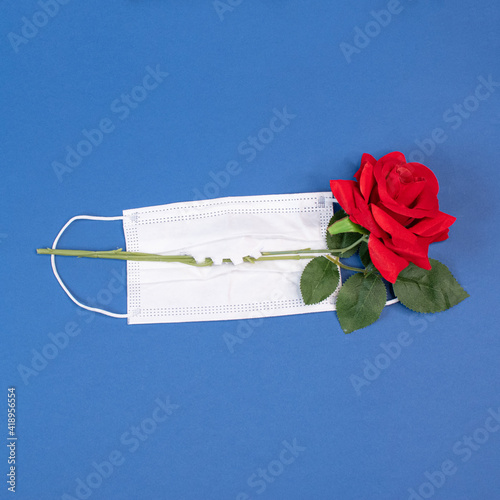 rose in the mouth of a mask, love in a time of pandemic, nothing can stop love