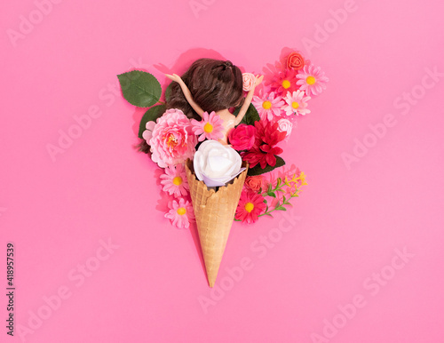 a doll in a cornet with flowers, a concept for Valentine's Day or Mother's Day