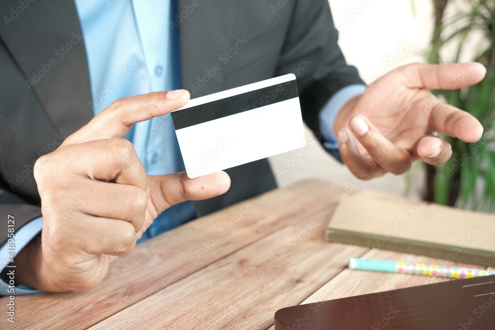 young man hand showing credit card and frustration young man hand showing credit card and frustration