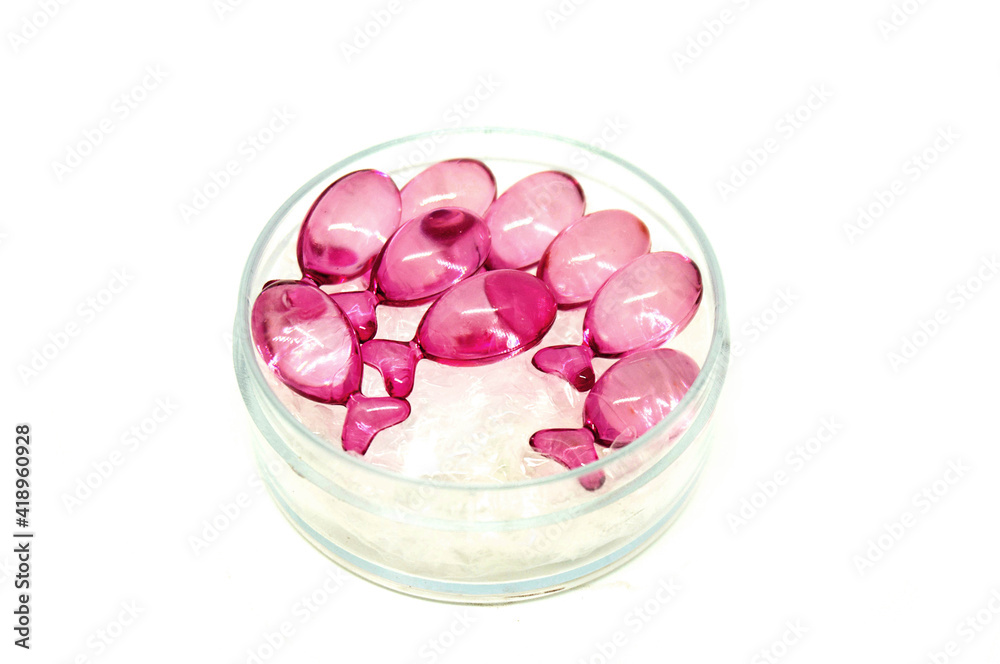 Vitamin serum capsule isolated on the white background with Clipping path Vitamin serum capsule isolated on the white background with Clipping path