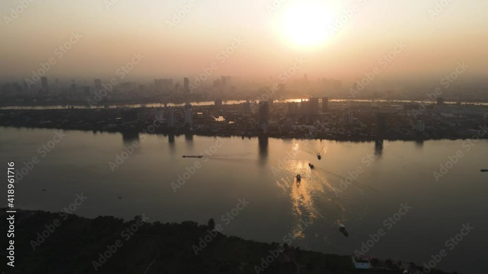 Sunset time over the Mekong river and Phnom Penh, capital of Cambodia