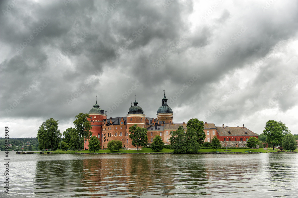 dramatic sky over an old castle in Sweden