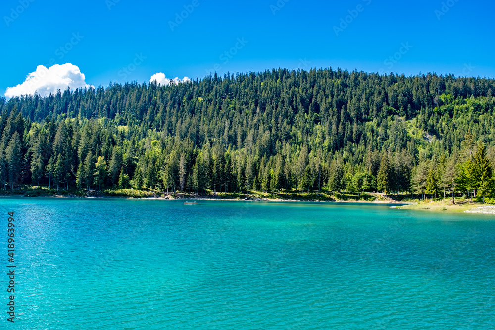 Turquoise lake and forest