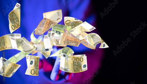 growth euro banknote in hand rain