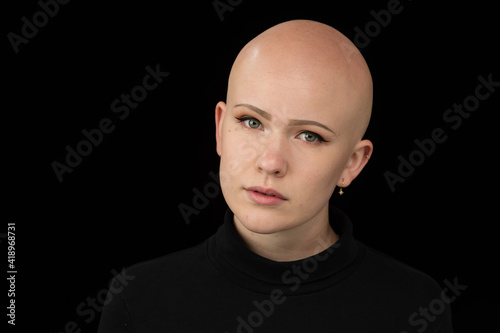 Young urban woman with blue eyes and a fair complexion poses for the camera.