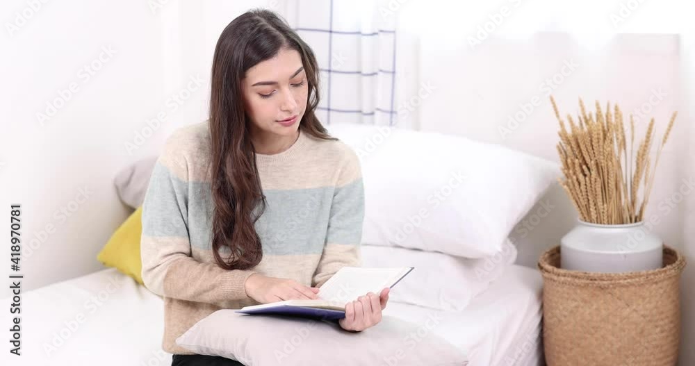Young pretty woman drinking coffee and reading a book enjoys of rest. Young pretty woman drinking coffee and reading a book enjoys of rest.