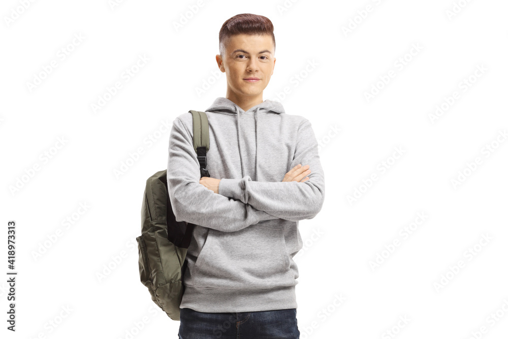 Teenage male student standing and smiling at the camera Teenage male student standing and smiling at the camera