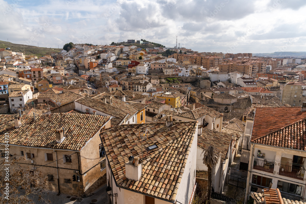 view of the rooftops and colorful houses of the old city center of Cuenca