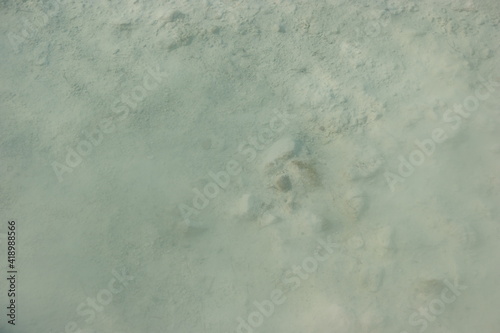Beautiful texture of water on limestone. Turquoise water in travertine pools at Pamukkale, Turkey.