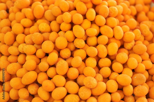 Fotografi Crispy coated peanuts background