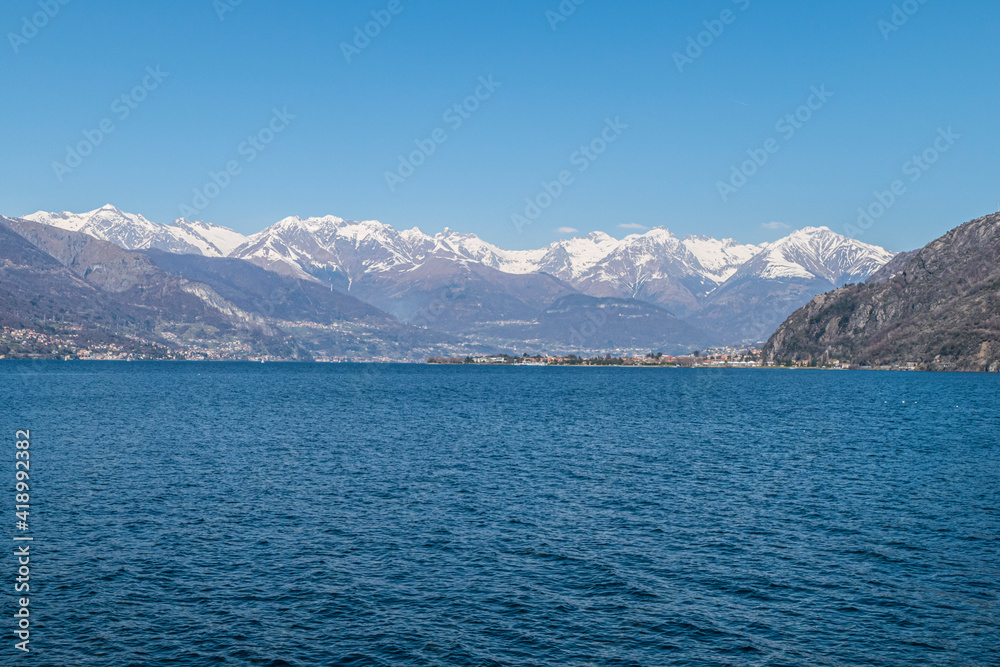 Landscape of the Lake of Coo with Dervio and the Alps in background Landscape of the Lake of Coo with Dervio and the Alps in background