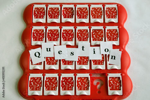 inscription question on paper is located on the board game