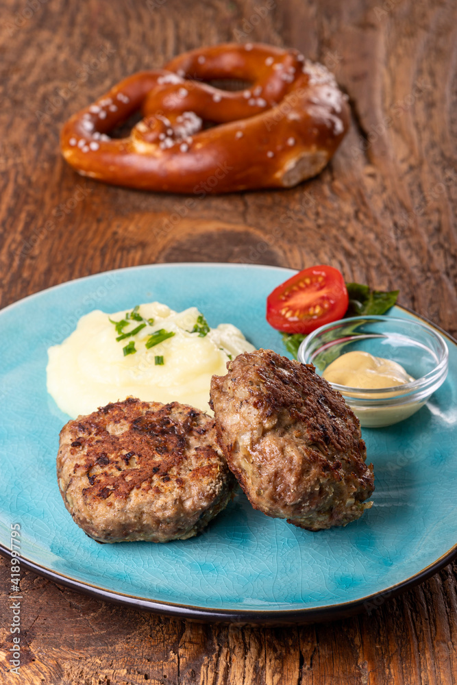 two bavarian meat loafs on a plate