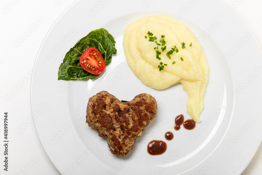 heart shaped  meat loaf on a plate