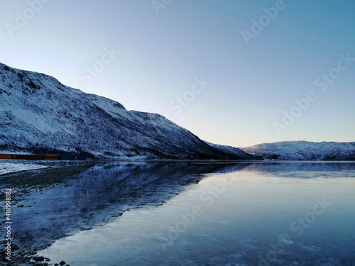 Snowy landscape in Kattfjorden, Tromso, Norway photo