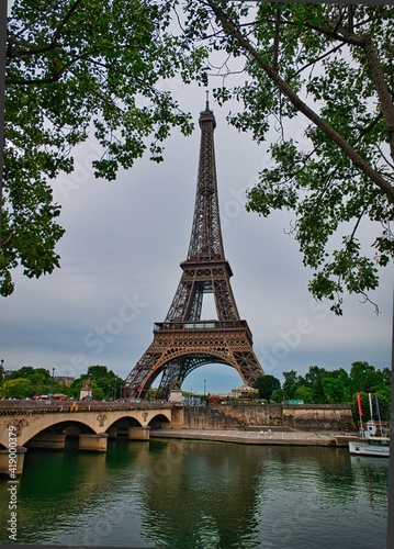 View on the famous paris eiffel tower from the promenade of the Seine . © khalid