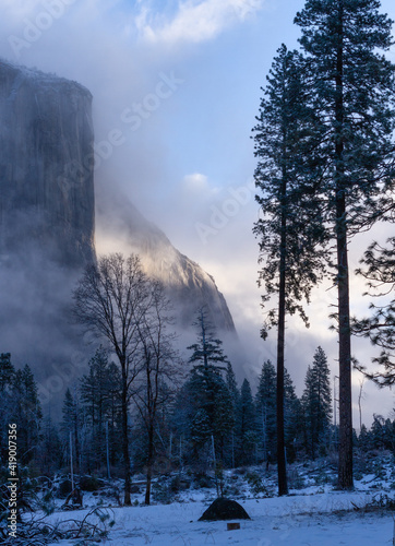 Morning light fights through to light Yosemite valley